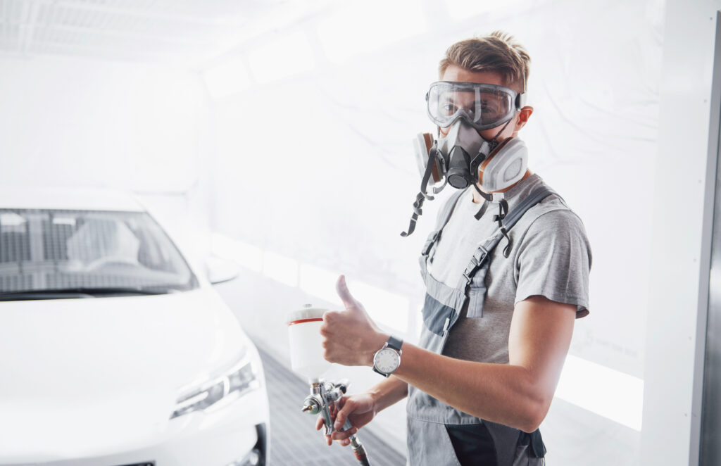 The procedure of painting a car in the service center.